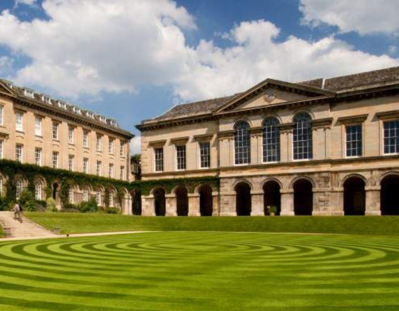 The quad and surrounding buildings of Oxford University's Worcester College are bathed in light